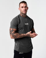 Right side angle of the dark grey Contour Men’s T-Shirt, featuring a soft, stretchable cotton blend and a sleek, athletic fit.