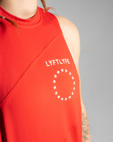 Close-up of women's sleeveless shirt featuring the white Lyftlyfe logo and circle star.