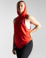 Left side view of women’s sleeveless hooded tank top in red with sweat-wicking tri-blend fabric.