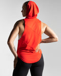 Back view of women’s sleeveless hooded tank top in red, featuring lightweight stretch fabric and a relaxed fit.