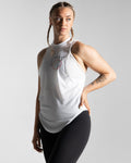 Right side view of Women’s sleeveless shirt featuring three panels in white, sweat-wicking fabric, and Lyftlyfe logo with a circle star on the chest.