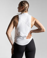 Rear-facing women’s sleeveless tank top showcasing wrinkle-resistant tri-blend material with a long, loose scoop design.