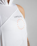 Highlight of the Lyftlyfe logo and circle star on a women's sleeveless hoodie in white. 