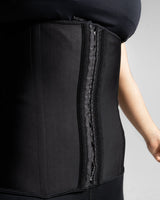 Close-up showing 3-row hook-and-eye closure on waist trainer.