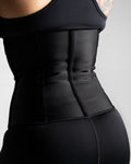 Full back shot of sleek, contoured waist trainer fit.