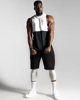 Men’s sleeveless shirt with two panels, white on top and black at the bottom, made with tri-blend fabric for performance and sweat-wicking.