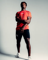 Contour Men’s T-Shirt in red, crafted from moisture-wicking, high-performance cotton with a second-skin feel.