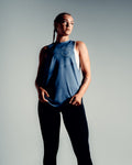 Women’s Dominance sleeveless shirt in blue, featuring lightweight tri-blend fabric with antibacterial and anti-odor technology.