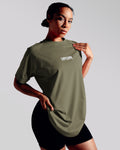 Oversized Contour Women’s Tee in green, featuring a moisture-wicking cotton blend and soft crew neckline for all-day comfort.