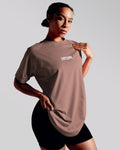 Oversized Contour Women’s Tee in rose color, featuring a moisture-wicking cotton blend and soft crew neckline for all-day comfort.