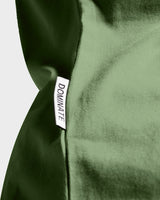 Detailed view of the LYFTLYFE side flag tag on the Contour Tee in light green, adding a signature touch to the women's t-shirt.