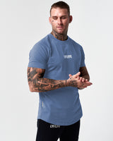 Left side view of Men’s Contour T-Shirt in blue, featuring a fitted design, soft crew neckline, and a white LYFTLYFE logo on chest.