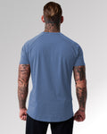 Back view of Men’s Contour T-Shirt in blue, featuring a fitted design, soft crew neckline, and a white LYFTLYFE logo on chest.