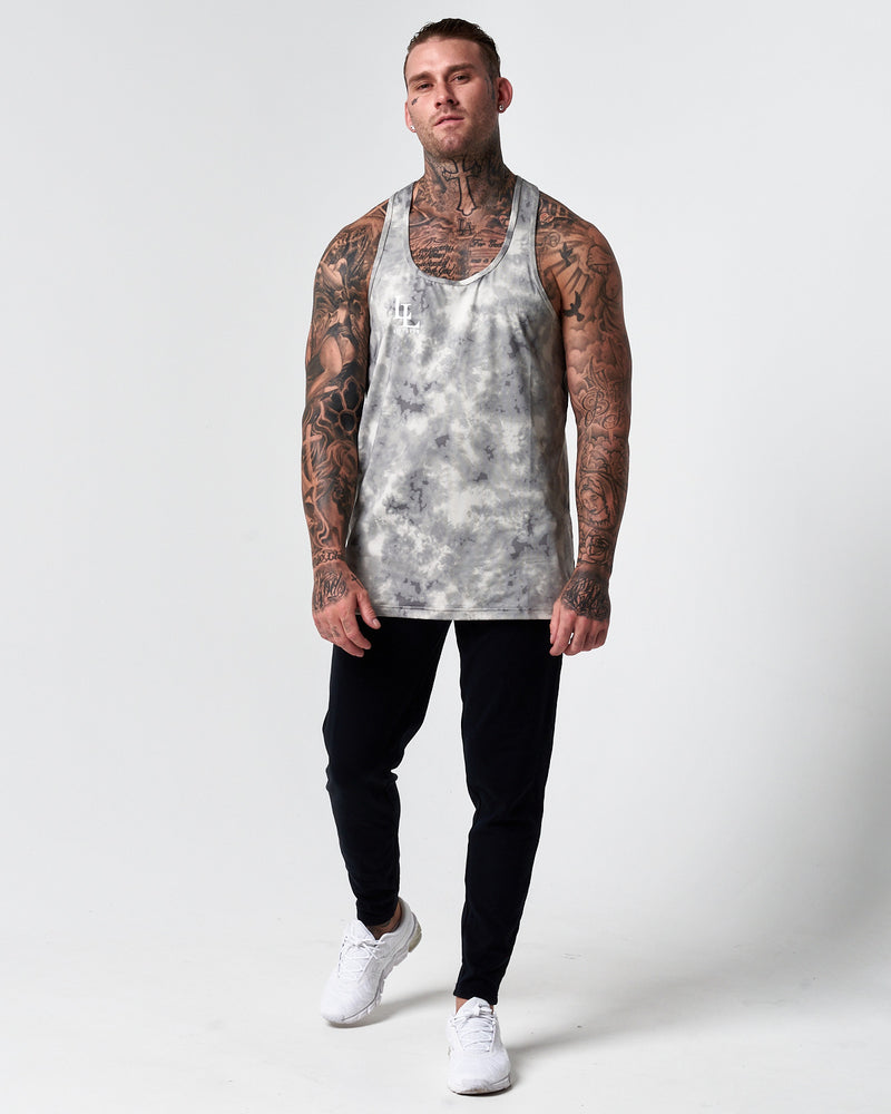 Mens tank top in an all over white and charcoal print.