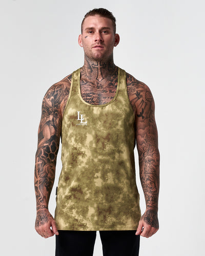Green tie dye racerback tank top with white LL logo on a light grey background.
