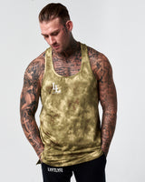 Model wearing sweat-wicking green gym stringer tank front view.