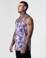 Left side view of lightweight purple men's gym stringer with side slit.