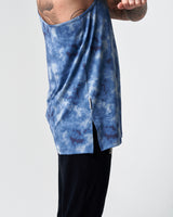 Close-up of stitched seam and tag detail on blue sponge print stringer.