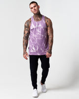 Men's light purple marble gym tank paired with LYFTLYFE performance joggers.