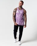 Full body view of light purple marble print men's tank with black joggers.