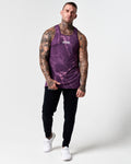 Full body view of dark purple marble print men's tank with black joggers.