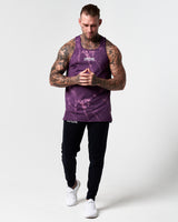 Head-to-toe shot of model wearing dark purple marble gym tank.