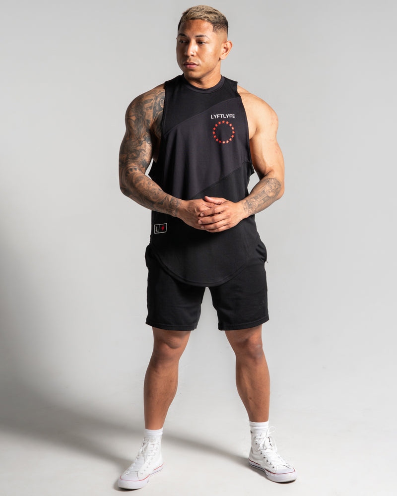 Men's sleeveless tank top in Black with a red logo on the left chest. 