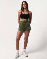 Green Women’s Balance shorts with ultra-plush material, elastic waistband, and a modern high-waisted design.