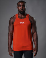 Mens tank top in a red molten color. White logo in the middle of chest.