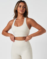LYFTLYFE Force Bra in soft white with 4-way stretch fabric and moisture-wicking technology for performance.