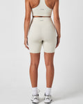 Back view of Force 6.5" women’s shorts in vapor white, featuring LYFTLYFE logo centered on waistband.