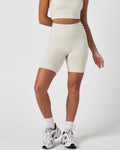Front view of women’s Force 6.5" biker shorts in vapor white, featuring a seamless waistband and sculpting fit.