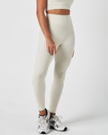 Right side view of women’s Force Leggings in Vapor White, featuring high-waisted sculpting fit and buttery-soft finish.