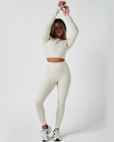 Full body view of women’s Force Long Sleeve Crop paired with matching leggings in vapor white.