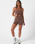 Full body image of Force Bra in brown paired with matching 4'' shorts for a sleek and supportive fit.