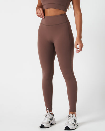 Women’s Force Leggings in brown, featuring high-waisted sculpting fit and buttery-soft finish.
