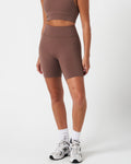 Left side view of Force 6.5" brown biker shorts, highlighting the snug fit and buttery soft stretch fabric.