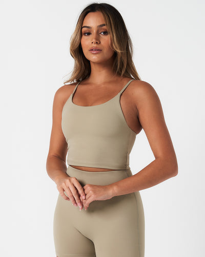 Women’s Force workout tank top in light green, designed with compressive fit and soft four-way stretch fabric.