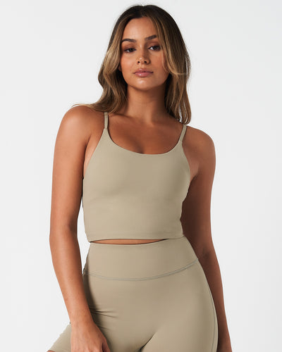 Women’s Force workout tank top in light green, designed with compressive fit and soft four-way stretch fabric.