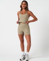 Full body image of Force Tank in light green paired with matching shorts for a sleek and supportive fit.