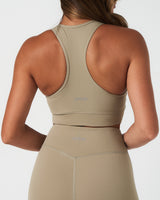 Rear view of Force 6.5" women’s shorts in light green, featuring LYFTLYFE logo centered on waistband.