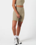 Light green Force shorts from the right side, showcasing the contoured shape and smooth finish.