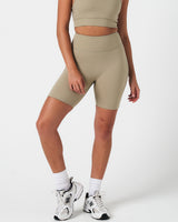 Lightweight and smooth high-rise women’s shorts with 6.5" inseam, shown from the front in light green.