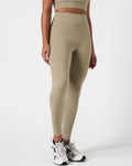 Right side view of women’s leggings with 4-way stretch and second-skin comfort in light green.