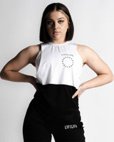 Women’s two-panel sleeveless shirt, white on top and black on the bottom with a black Lyftlyfe logo on the chest.