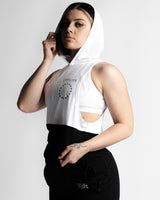Side view of Women’s athletic sleeveless hoodie, white on top and black on the bottom, made with tri-blend fabric for performance. 