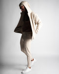 Full-body outfit with Function hoodie unzipped, paired with matching Function joggers in beige. 