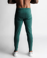 Men’s dark green joggers rear profile with contoured seams and secure pocket design. 