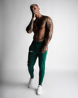 Men’s dark green joggers with relaxed fit and front LYFTLYFE branding. 