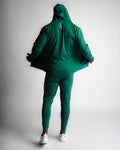 Full-body outfit back view with Function hoodie and matching Function joggers in green. 
